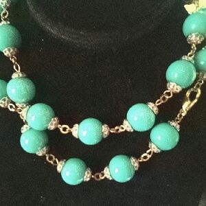 Elegant Blue Beaded Necklace with Pink Rhinestones